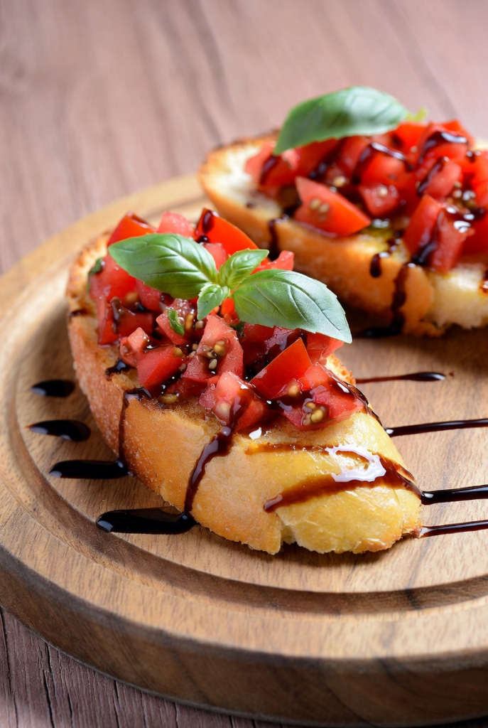 Fresh bruschetta with diced tomatoes and basil on toasted bread